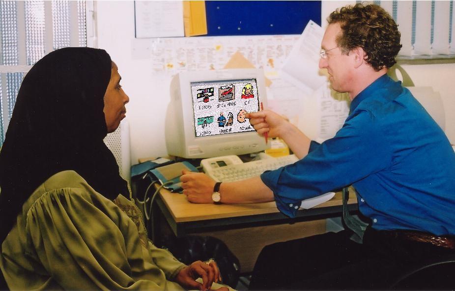 The doctor is using AAC-like symbols on his computer
to communicate with this Somali patient