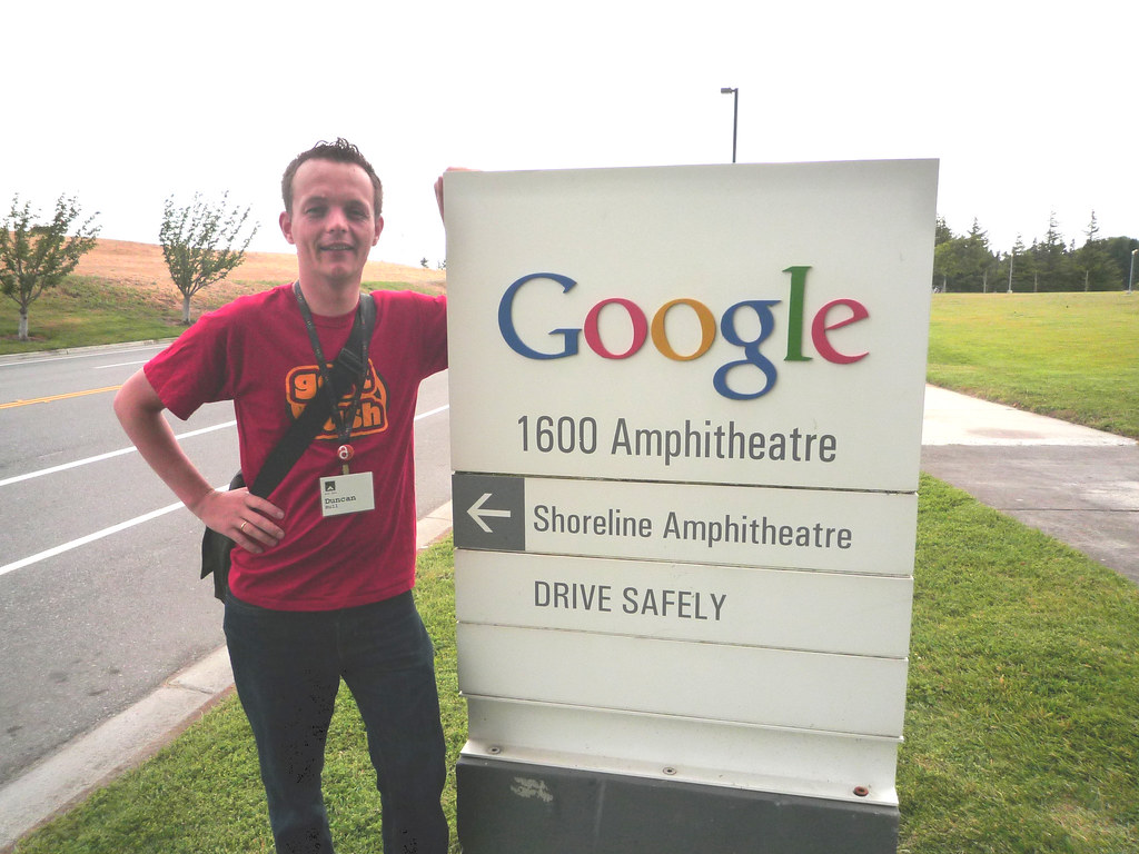Posing in the Googleplex at 1600 Amphitheatre Parkway in Mountain View, California. Thanks to Andrew Lang for taking this picture during Science Foo Camp back in the more optimistic days of “Don’t be evil” (Brin, Page, and Buchheit 2004; Hull 2007, 2009), old skool Google logos (Kedar 2023) and the unfortunate enshittification of the internet. (Doctorow 2025, 2024)