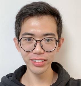 A person wearing glasses and smiling

AI-generated content may be incorrect.